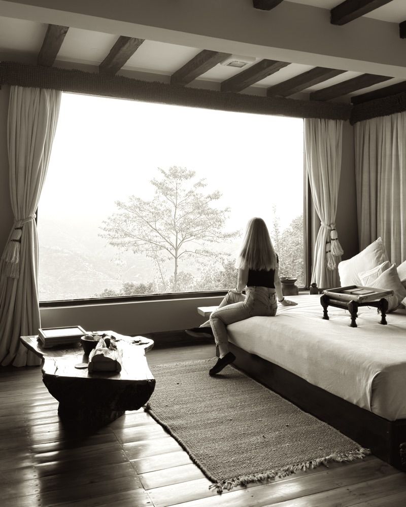Morning in a mountain suite — the whole valley in the window